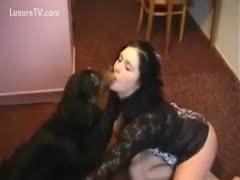 Teen kisses and sucks the dog